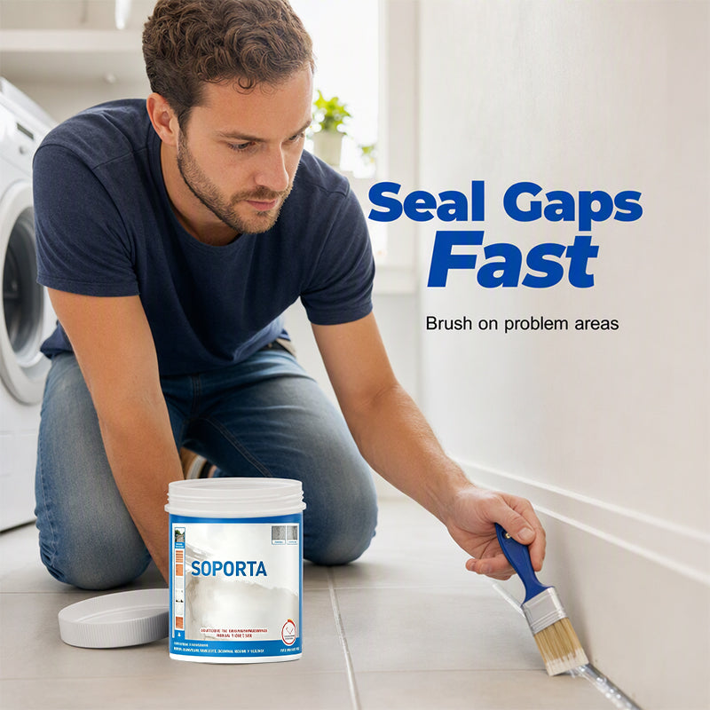 Brush applying clear waterproof sealant along a floor seam